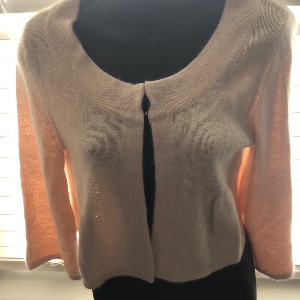 Sleeping on snow cropped cardigan.Size M
